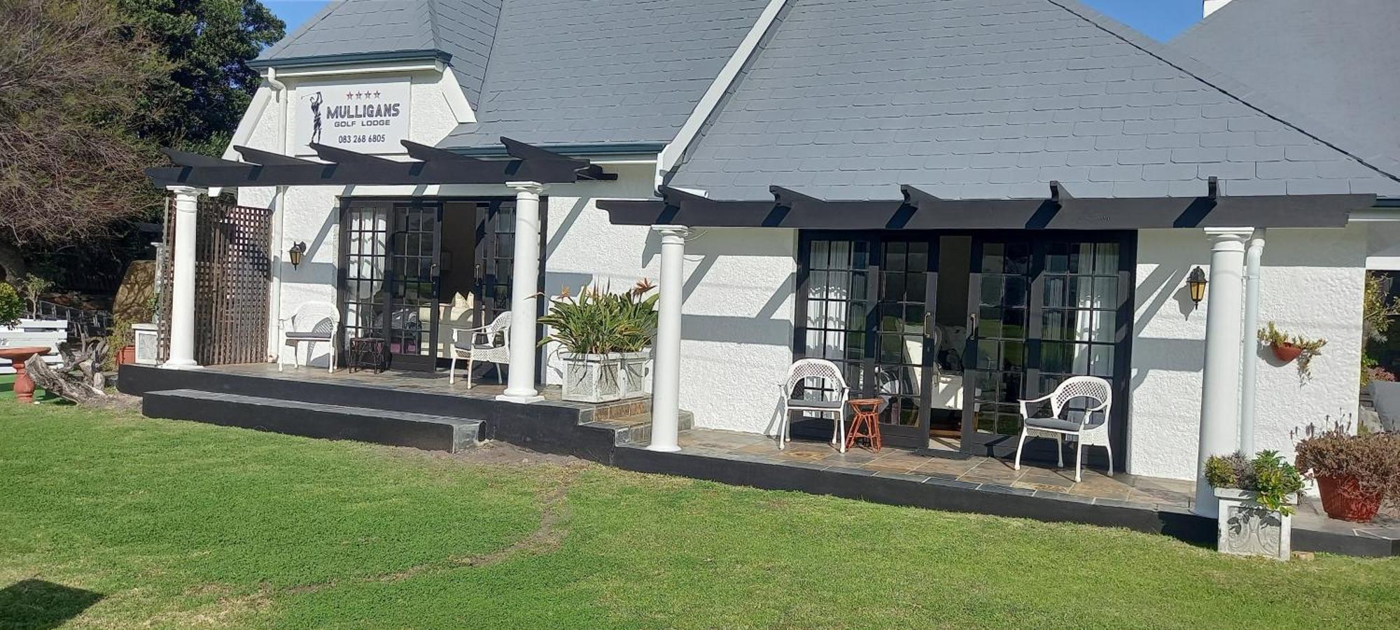 Mulligans Guest Lodge Херманус Экстерьер фото