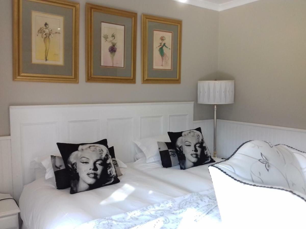 Mulligans Guest Lodge Херманус Экстерьер фото